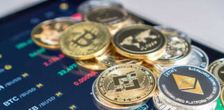 Cryptocurrency coins on digital trading screen