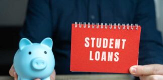 A blue piggy bank and a red notebook displaying 'STUDENT LOANS'