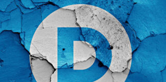 Democratic Party logo on a cracked, peeling surface.