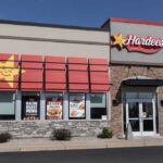 Exterior view of a Hardee's fast food restaurant with signage