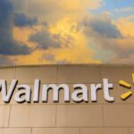 Walmart sign against a cloudy sky