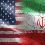 Iran Drone Plot Targets United States Coast Flags of the United States and Iran blended together with a cracked texture