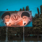 Billboard with portraits of two Iranian leaders.