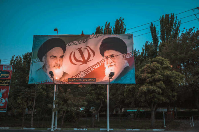 Billboard with portraits of two Iranian leaders.