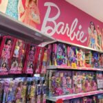 Fentanyl Barbie Scare Sparks Police Investigation Shelves filled with various Barbie dolls and accessories in a toy store