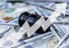 An oil barrel placed on a background of dollar bills with an upward trend graph overlay