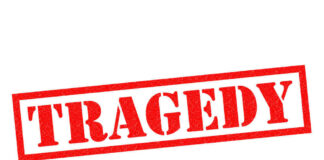 Red tragedy stamp on white background