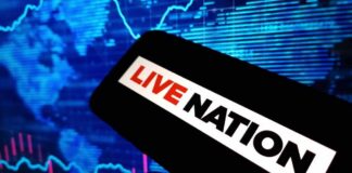 A mobile device displaying the Live Nation logo against a digital background