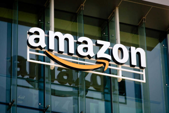 shutterstock_2507295771.jpg Amazon logo on a glass office building